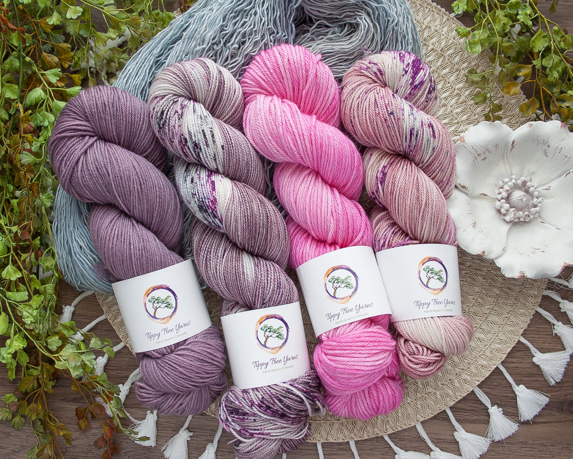 hand dyed wool yarn in pink speckles purple pretty yarns